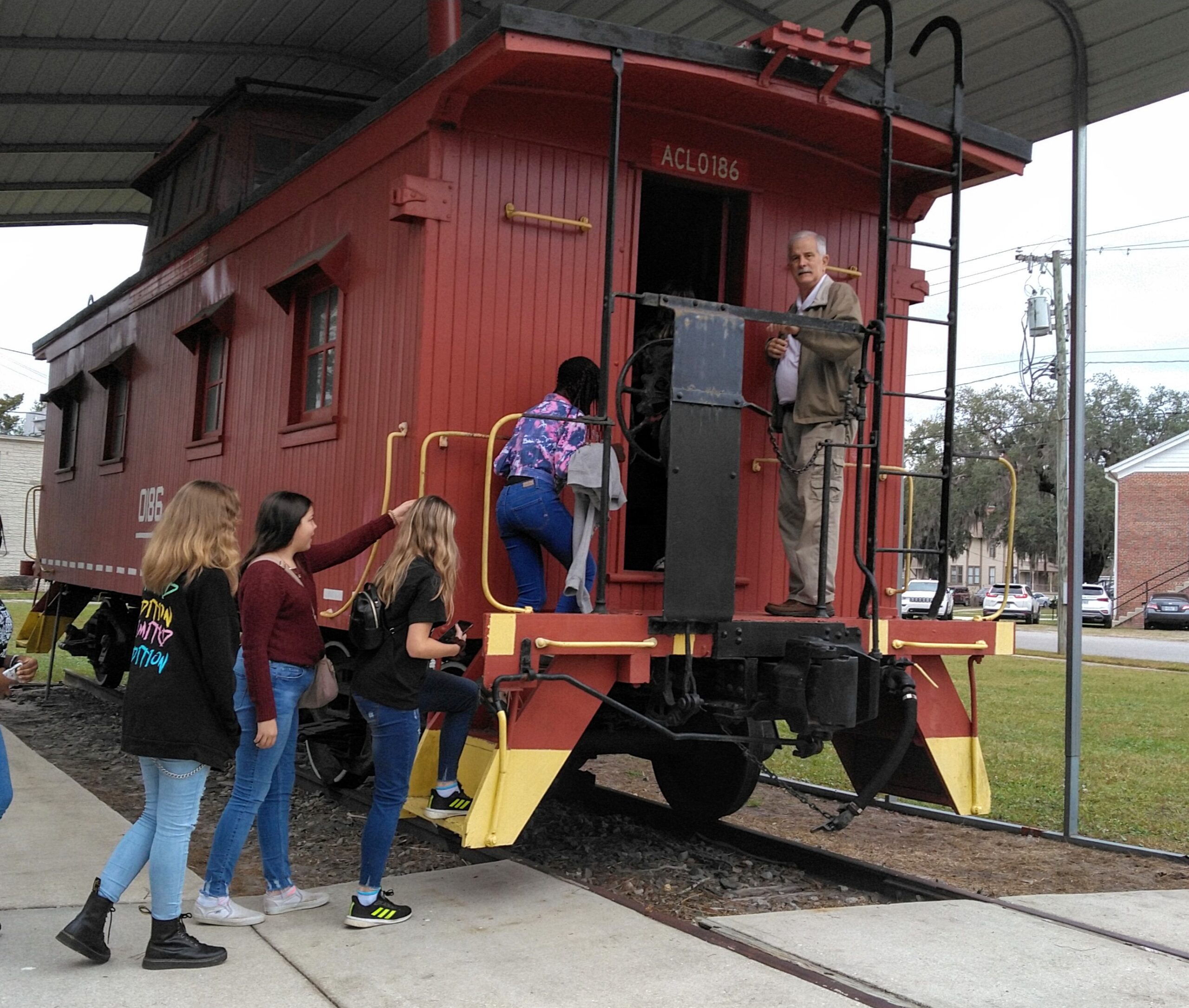 Climb Aboard the Red Caboose!